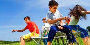 group of kids playing musical chairs