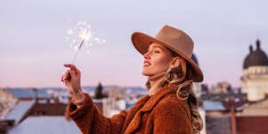 woman holding sparkler