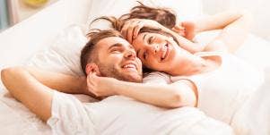 happy couple in bed