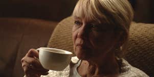elderly woman drinking tea
