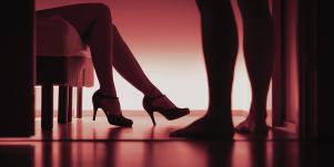 high heels with red lighting background