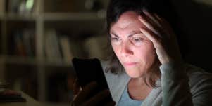 woman looking at computer screen