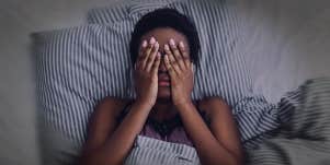 woman covering face