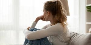 side view of young woman looking away
