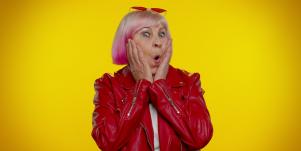 shocked stylish older woman