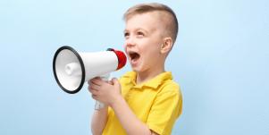 boy yelling through megaphone