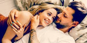 man and woman laying together