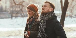 couple walking in the snow