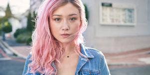 sad girl with pink hair