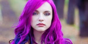 woman with vibrant purple hair