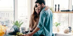 man and woman in kitchen