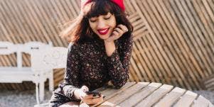 woman looking at phone