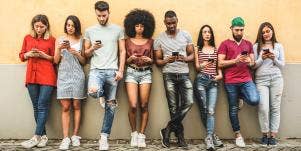 crowd of people on phones