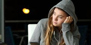 sad woman listening to songs for the dumped