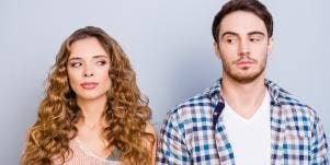 two people side-eyeing each other 