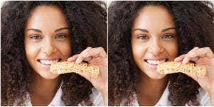 woman eating cereal bar