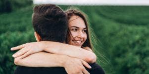 woman hugging man