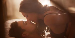 intimate couple in bed