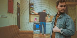 Man busy with life in blur, man standing still calm 