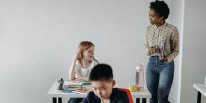 Teacher talking to students