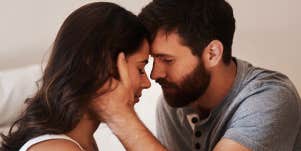 man holding woman close