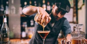 bartender pouring drinks