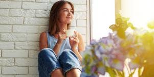 woman relaxing on balcony