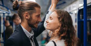 man and woman meeting on train