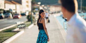 man looking at woman