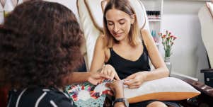 woman getting nails done