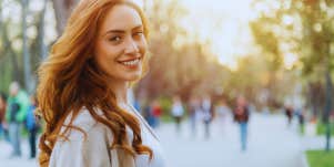 woman smiling outside