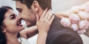 happy man and woman almost kissing
