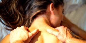 man giving woman sexual massage