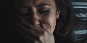 upset woman in shadwo