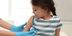 girl getting vaccine