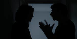couple arguing in the dark