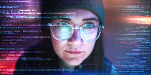 Double exposure, woman in dark room at night with a look of concentration on her face