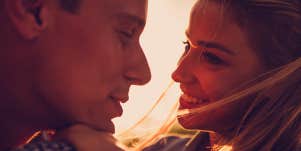 man and woman looking at each other close