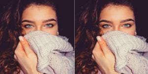 woman with sweater over her mouth