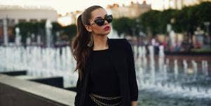 woman in black wearing sunglasses