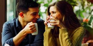 man and woman drinking coffee
