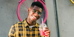 man drinking juice 