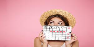 woman holding period schedule