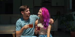 man and woman drinking tea