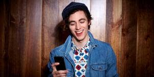 happy man texting 