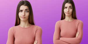 confused woman standing with her arms folded
