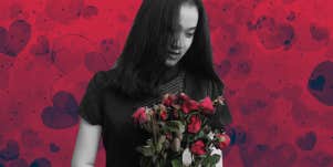 unhappy girl holding roses