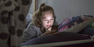 woman looking at phone