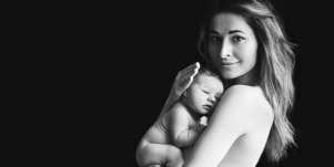 mother holding baby