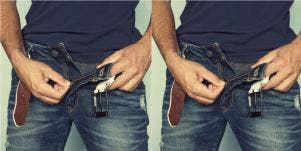 man unzipping pants
